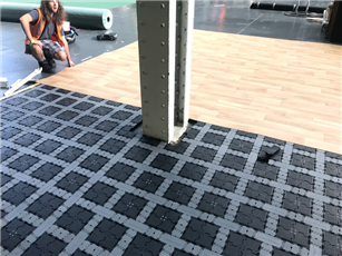 Qik-Link Modular flooring allows for the floor to be stripped back easily, making it perfect for building around columns,like this one at London Olympia