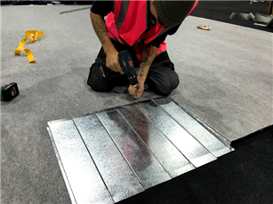 A disability access ramp being installed on a Qik-Link platform